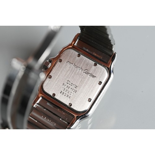 431 - A Cartier Santos Carree gold and stainless steel square wristwatch, quartz movement with calendar ap... 
