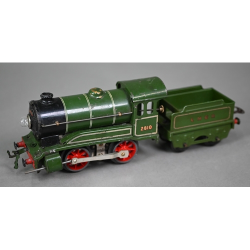 1020 - A boxed Bassett-Lowke scale model L.M.S. 4-4-0 electric locomotive and tender, lightly played-with, ... 