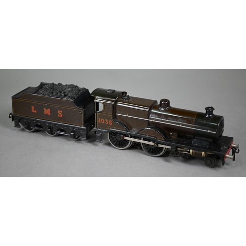 1020 - A boxed Bassett-Lowke scale model L.M.S. 4-4-0 electric locomotive and tender, lightly played-with, ... 