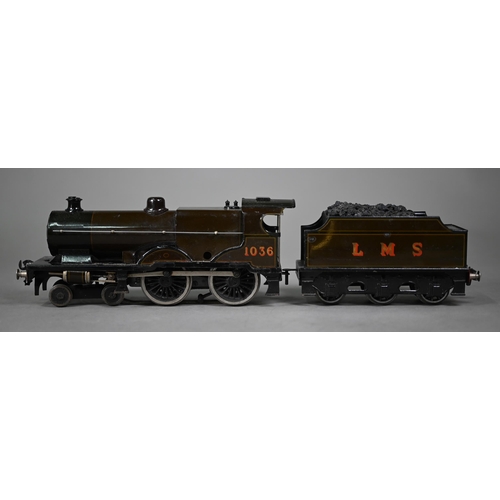 1020 - A boxed Bassett-Lowke scale model L.M.S. 4-4-0 electric locomotive and tender, lightly played-with, ... 