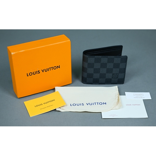 1023 - Louis Vuitton - A gent's black and grey folding wallet, with protective pouch and cardboard box