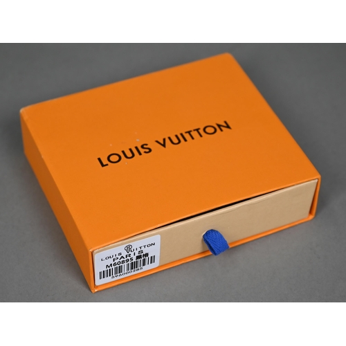 1023 - Louis Vuitton - A gent's black and grey folding wallet, with protective pouch and cardboard box