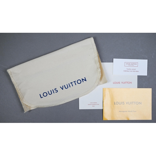 1023 - Louis Vuitton - A gent's black and grey folding wallet, with protective pouch and cardboard box