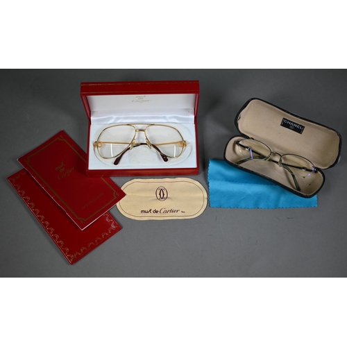 1024 - Must de Cartier - A pair of optical glasses, Vendome Louis Cartier, stamped 59 14 to nose bridge, in... 