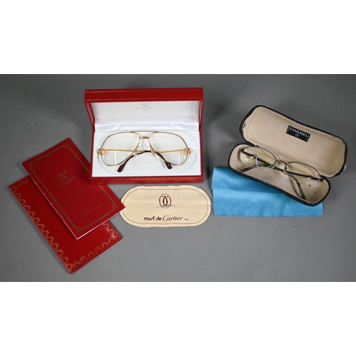 1024 - Must de Cartier - A pair of optical glasses, Vendome Louis Cartier, stamped 59 14 to nose bridge, in... 