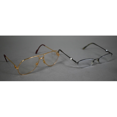 1024 - Must de Cartier - A pair of optical glasses, Vendome Louis Cartier, stamped 59 14 to nose bridge, in... 