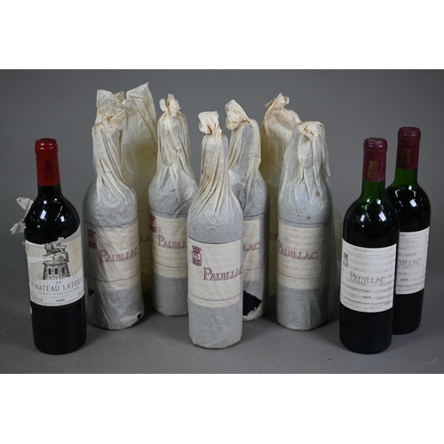 1026 - Seven bottles of 1974 Chateau Latour Pauillac red wine in original printed tissue wraps (some incomp... 