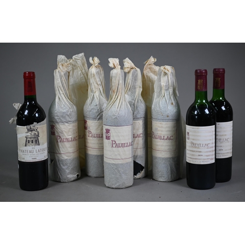 1026 - Seven bottles of 1974 Chateau Latour Pauillac red wine in original printed tissue wraps (some incomp... 