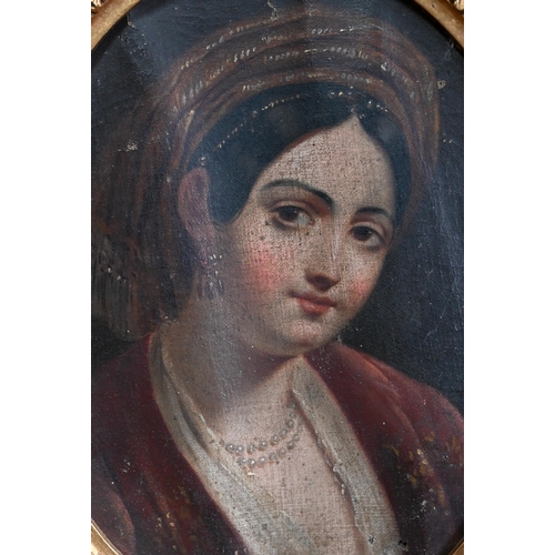 703 - Early 19th century possibly Spanish - Oval portrait of a lady in a red dress and headdress, oil on c... 