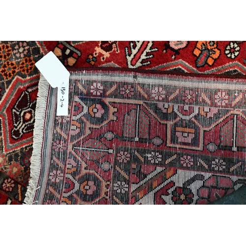 740 - A contemporary central Persian Bakhtiar camel rug, 203 cm x 154 cm
