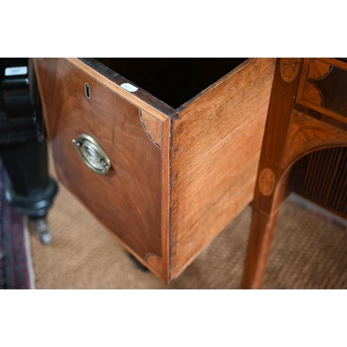 800 - A George III cross-banded and inlaid mahogany bow-fronted sideboard, centred by a frieze drawer over... 