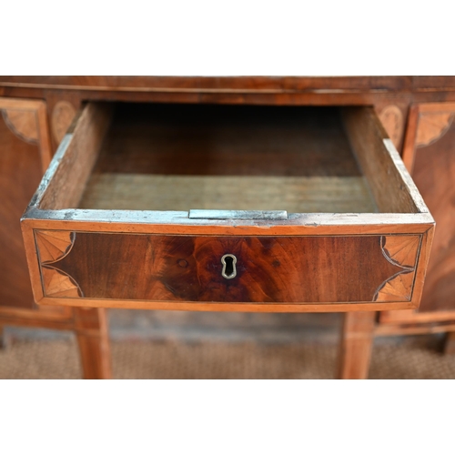 800 - A George III cross-banded and inlaid mahogany bow-fronted sideboard, centred by a frieze drawer over... 