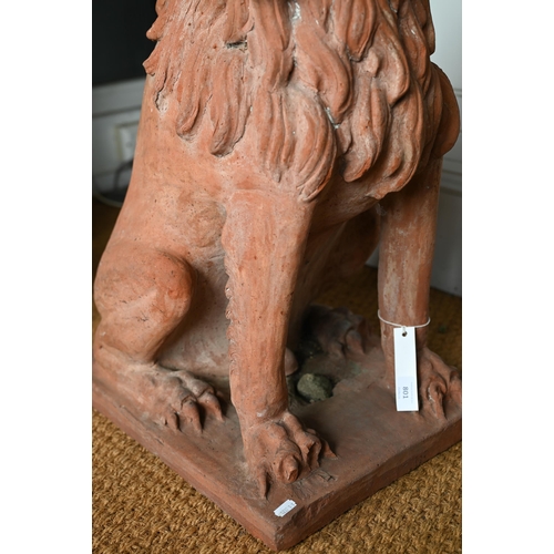 801 - An large terracotta seated lion of Italian origin, 20th century, raised on an integral plinth base, ... 