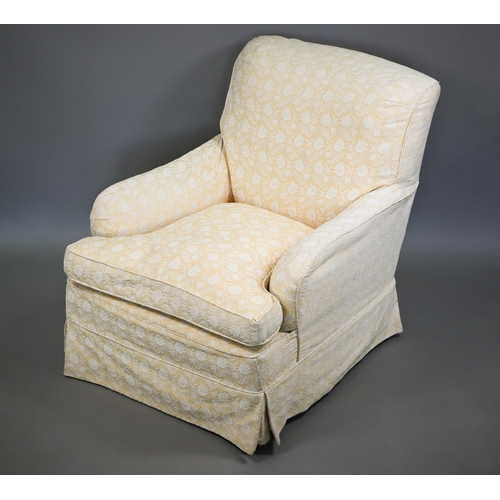 802 - A Howard style easy armchair, early 20th century, raised on short square section front legs to brass... 