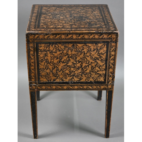 803 - An antique ebonised gilt decorated box raised on square section legs, 19th century, 39.5 cm x 40 cm ... 