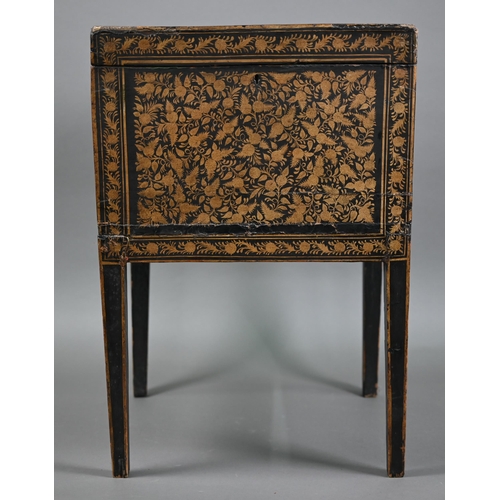 803 - An antique ebonised gilt decorated box raised on square section legs, 19th century, 39.5 cm x 40 cm ... 