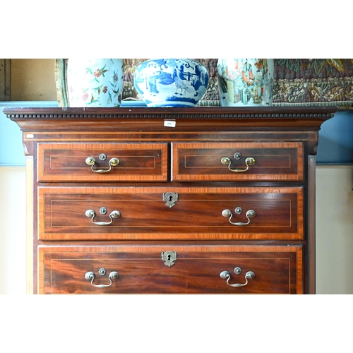 806 - A Victorian cross banded and inlaid bright mahogany chest on chest, the dentil moulded cornice over ... 