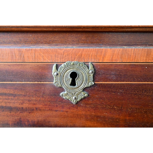 806 - A Victorian cross banded and inlaid bright mahogany chest on chest, the dentil moulded cornice over ... 