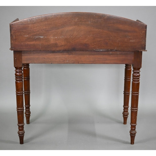 823 - A Victorian mahogany stand, the top with 3/4 gallery over a bead moulded frieze and raised on ring-t... 