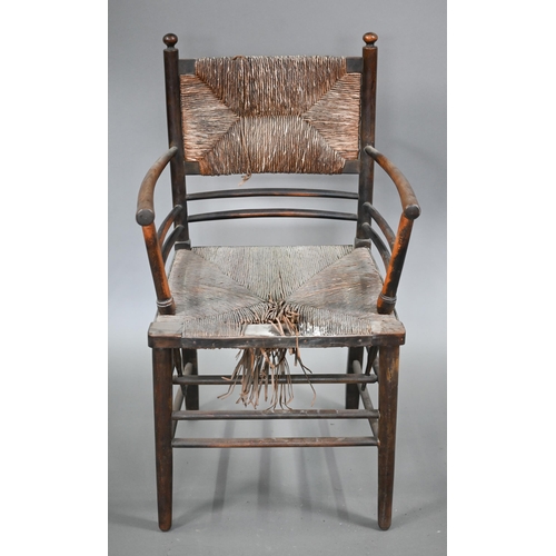 825 - Four Arts & Crafts Morris style Sussex stained ash chairs with rush seats, comprising an open ar... 