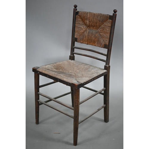 825 - Four Arts & Crafts Morris style Sussex stained ash chairs with rush seats, comprising an open ar... 