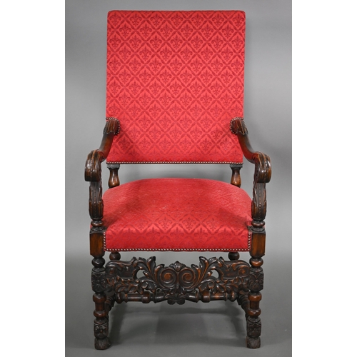 836 - A pair of 17th century style carved walnut throne armchairs, with studded rouge fleur-de-lys pattere... 