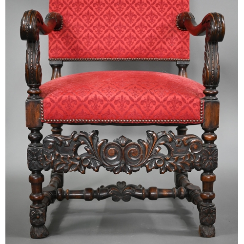 836 - A pair of 17th century style carved walnut throne armchairs, with studded rouge fleur-de-lys pattere... 