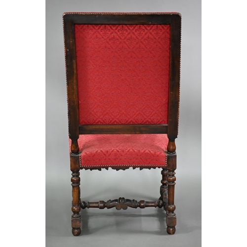 836 - A pair of 17th century style carved walnut throne armchairs, with studded rouge fleur-de-lys pattere... 