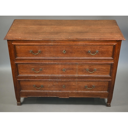 840 - A 19th century French oak three drawer commode chest, with brass fittings and raised on short fluted... 