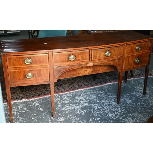 850 - A Georgian cross-banded and ebony line inlaid mahogany bow-fronted sideboard, centred by a pair of s... 