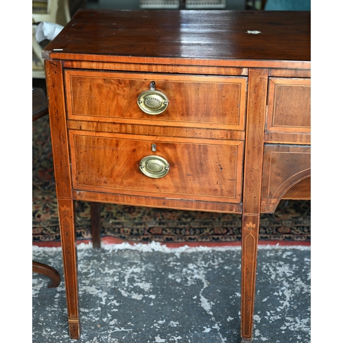 850 - A Georgian cross-banded and ebony line inlaid mahogany bow-fronted sideboard, centred by a pair of s... 