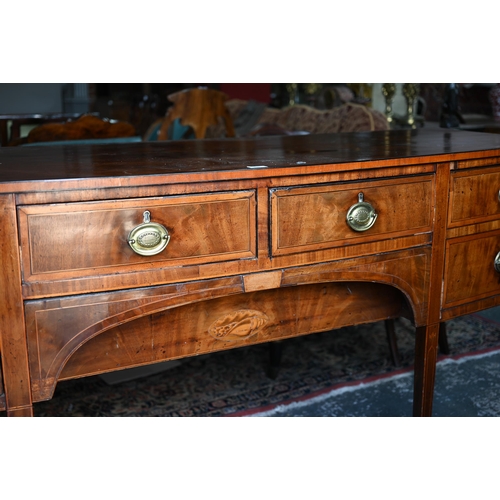 850 - A Georgian cross-banded and ebony line inlaid mahogany bow-fronted sideboard, centred by a pair of s... 