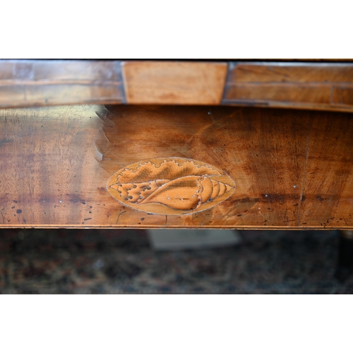 850 - A Georgian cross-banded and ebony line inlaid mahogany bow-fronted sideboard, centred by a pair of s... 