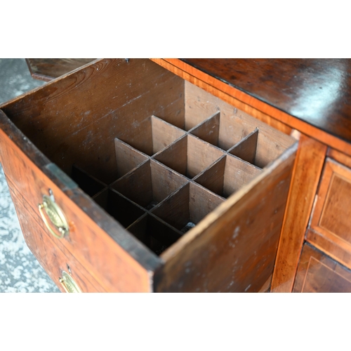 850 - A Georgian cross-banded and ebony line inlaid mahogany bow-fronted sideboard, centred by a pair of s... 