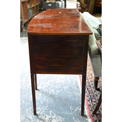 850 - A Georgian cross-banded and ebony line inlaid mahogany bow-fronted sideboard, centred by a pair of s... 