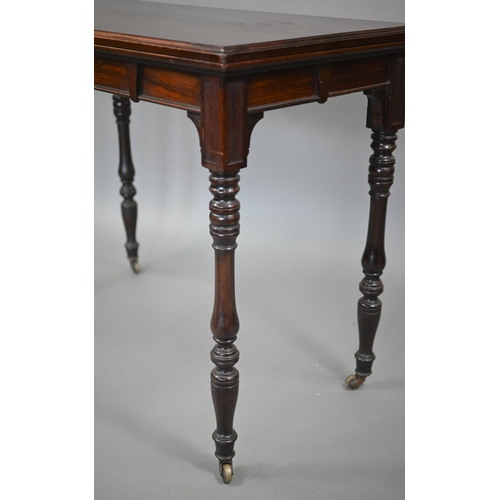 855 - G. Trollope & Sons, London, a rosewood card table, the rectangular fold over top enclosing a gre... 