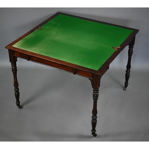 855 - G. Trollope & Sons, London, a rosewood card table, the rectangular fold over top enclosing a gre... 