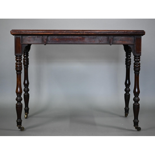 855 - G. Trollope & Sons, London, a rosewood card table, the rectangular fold over top enclosing a gre... 