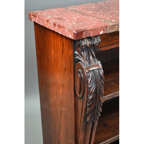 856 - A Victorian rosewood low open bookcase, with rouge marble top over two adjustable shelves, flanked b... 