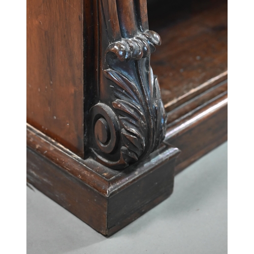 856 - A Victorian rosewood low open bookcase, with rouge marble top over two adjustable shelves, flanked b... 