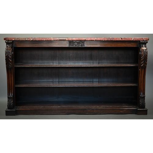 856 - A Victorian rosewood low open bookcase, with rouge marble top over two adjustable shelves, flanked b... 