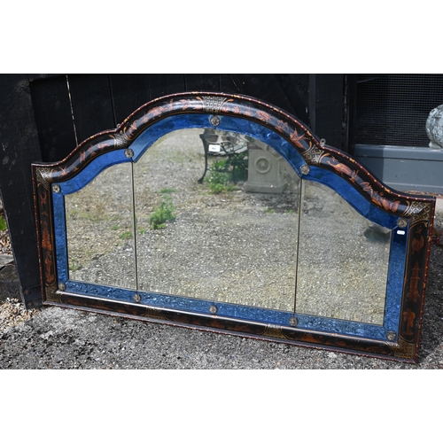 861 - A Chinoiserie decorated arched top over-mantel with blue glass bordered mirror, circa 1900, 150 cm x... 