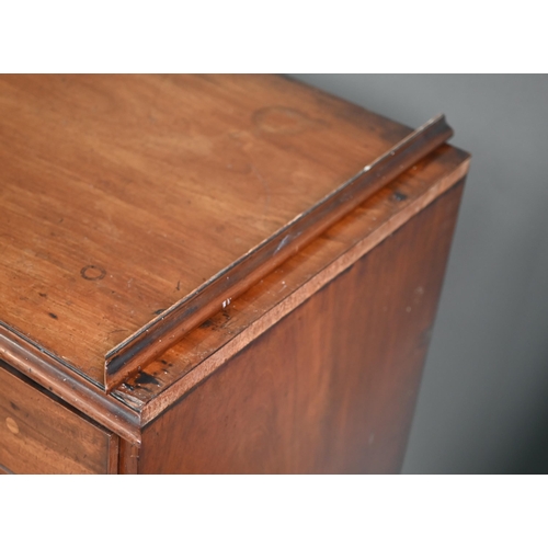 867 - A George III mahogany chest of two short over three long graduated drawers, with (later) brass fitti... 