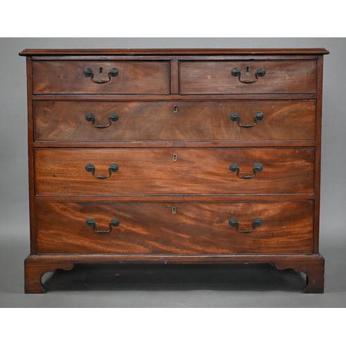 867 - A George III mahogany chest of two short over three long graduated drawers, with (later) brass fitti... 