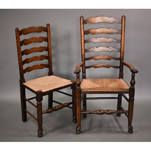 871 - A close set of eight traditional Lancashire ash framed rope seat wavy ladderback dining chairs, comp... 