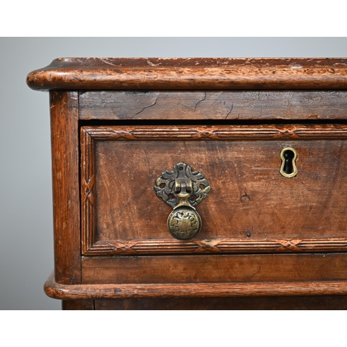 874 - A Victorian walnut twin pedestal desk, the inset tan leather top over an arrangement of moulded edge... 