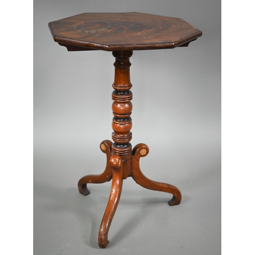 885 - An octagonal tilt top tripod table in the Chippendale manner, 19th century, 47 cm x 48 cm x 70 cm h