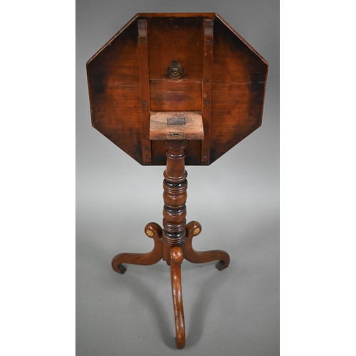 885 - An octagonal tilt top tripod table in the Chippendale manner, 19th century, 47 cm x 48 cm x 70 cm h