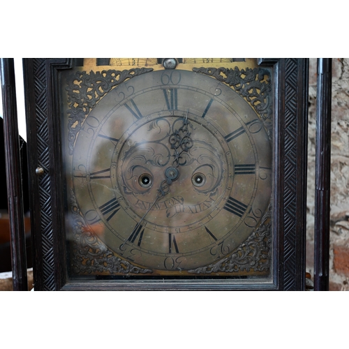 888 - J Newton, Hexham, an 18th century profusely carved and moulded oak longcase clock, the 8-day movemen... 