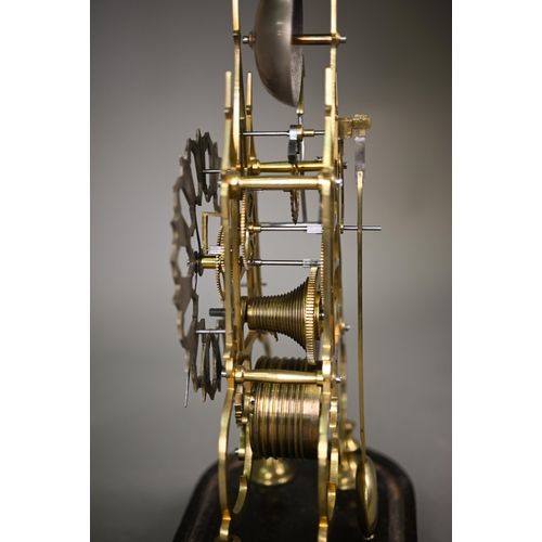 894 - A brass skeleton clock, the single fusee movement with silvered dial raised on an ebonised plinth un... 